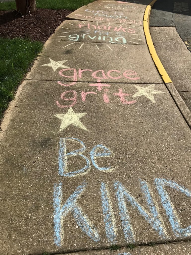 chalk art on sidewalks to display love and support to senior residents