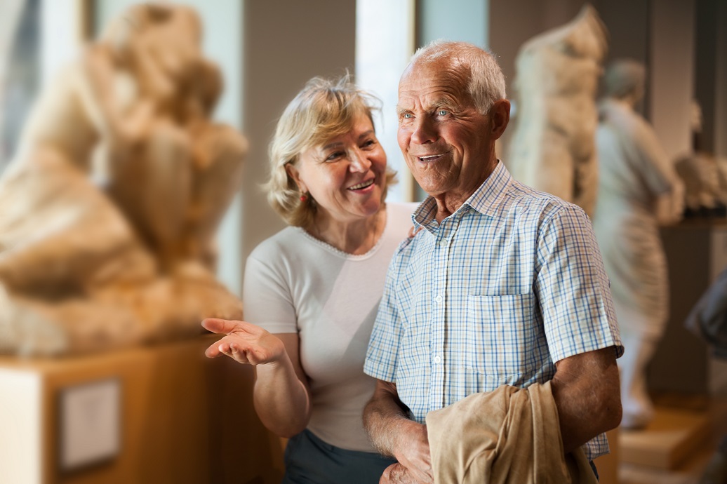 senior couple enjoying museum exhibit, lifelong learning