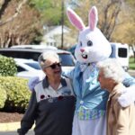 Seniors posing with Easter Bunny