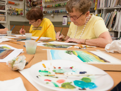 seniors participating in water color activity The Chesapeake Independent Living Community